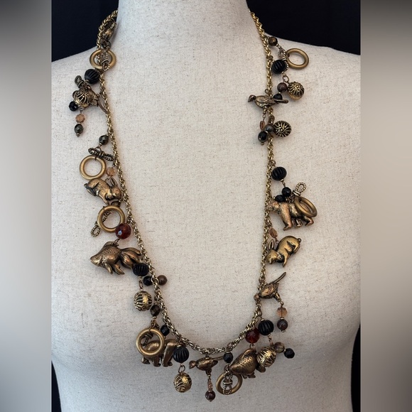 Vintage Roxanne Gold and Black Charm Long Necklace Runway Necklace Bears Fish - Picture 2 of 6